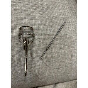 Eyeslash curler and blackhead remover